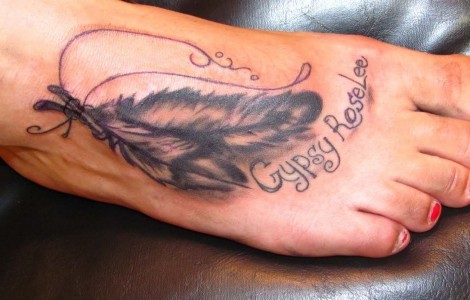 Black Ink Owl Feather Tattoo On Foot