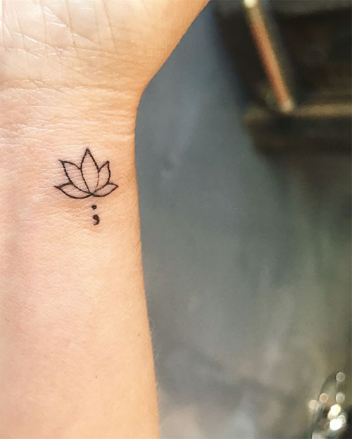 Black Outline Lotus Flower And Semicolon Tattoo On Wrist