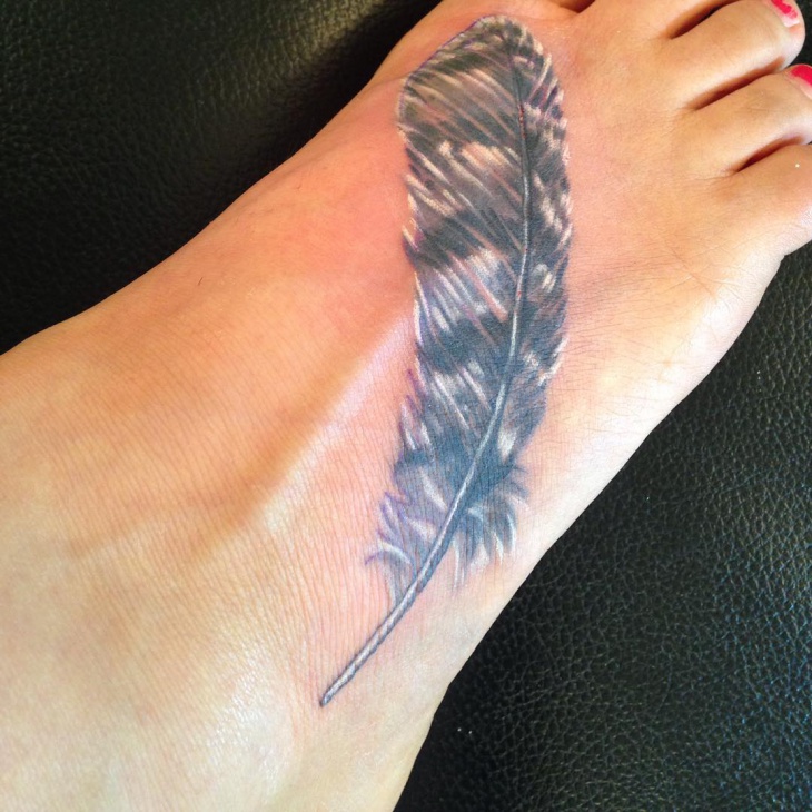 Black & White Ink Owl Feather Tattoo On Foot