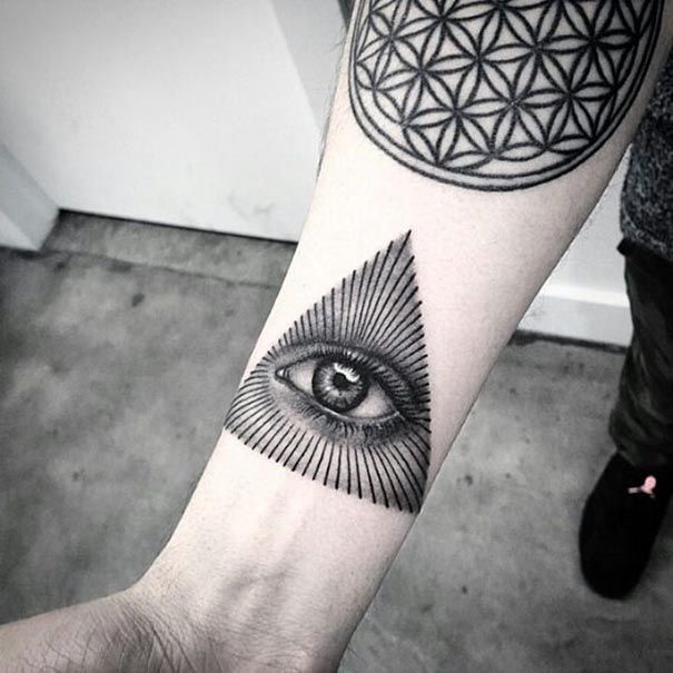 Cool Black Ink Illuminati Tattoo On Forearm