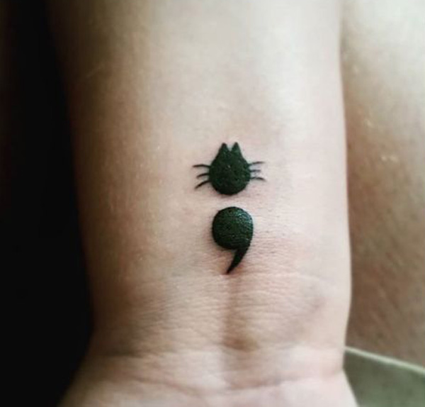 Cute Black Catty Semicolon Tattoo On Wrist