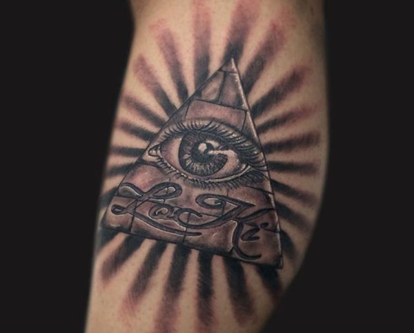 Grey Ink Glowing Illuminati Tattoo On Arm