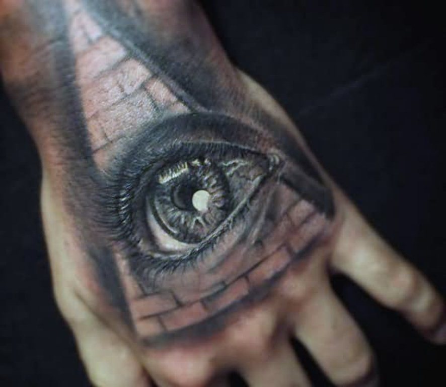 Grey Ink Realistic Eye Illuminati Pyramid Tattoo On Hand