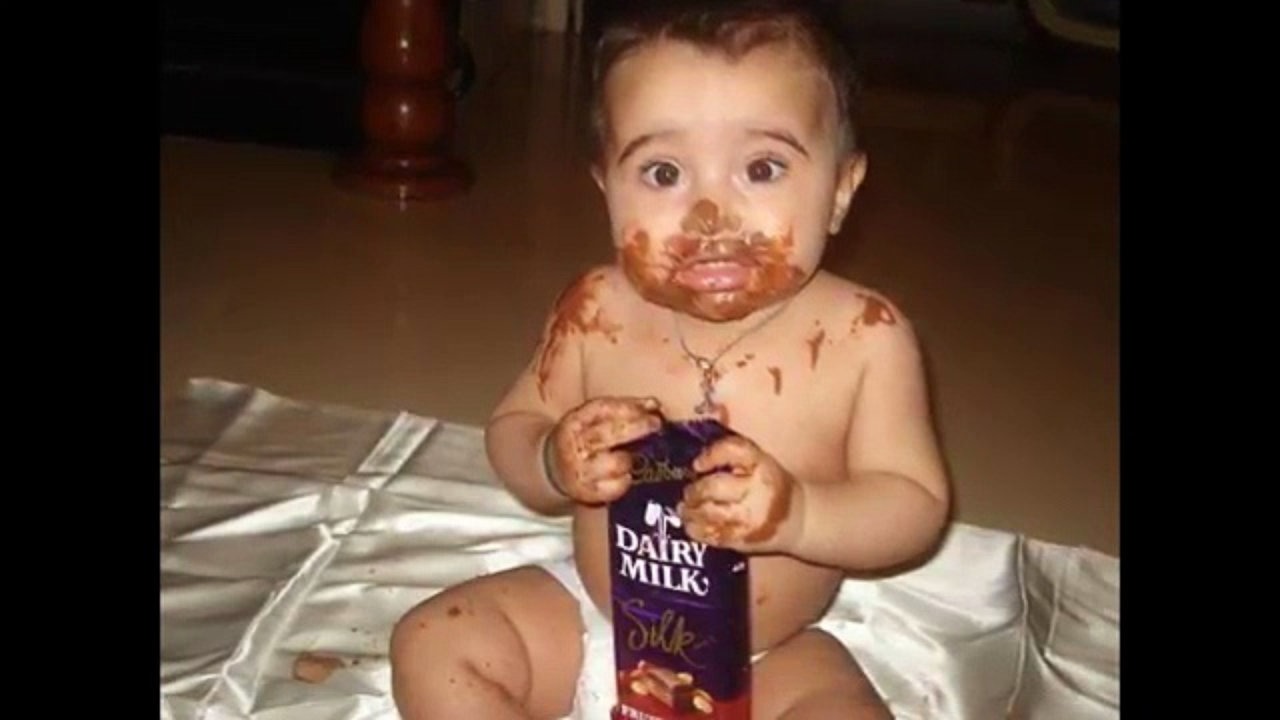 Kid eating chocolate funny picture