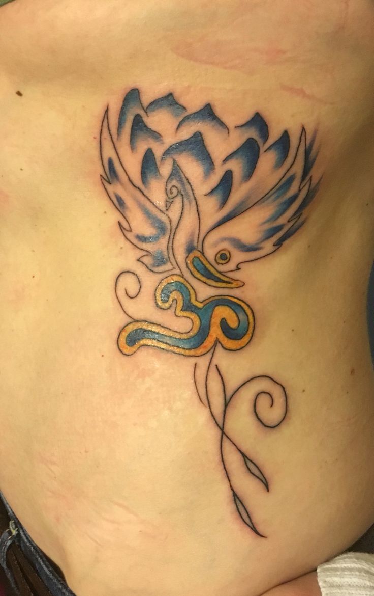 Lotus, Phoenix, and Om Symbol Tattoo On Siderib