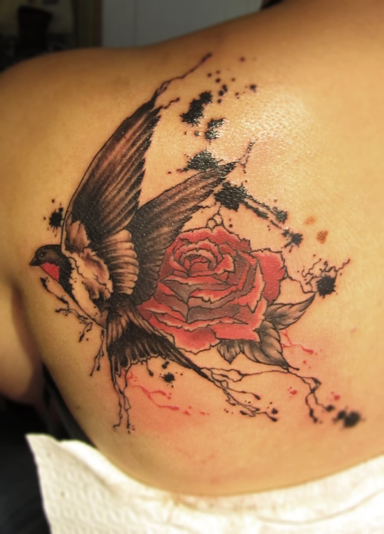 Realistic Colored Rose & Flying Swallow Tattoo On Girl Side Back