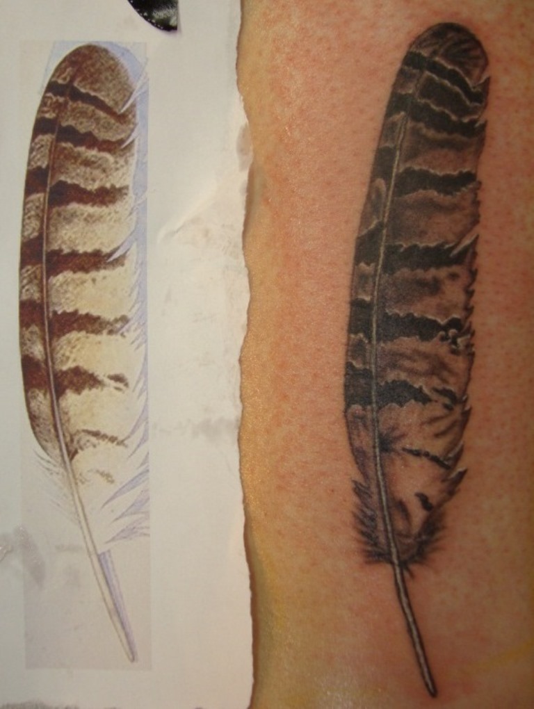 Realistic Owl Feather Tattoo On Siderib