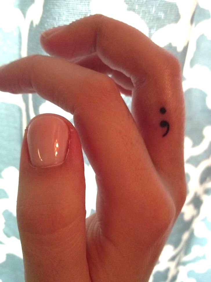 Small Cute Semicolon Tattoo On Girl Finger