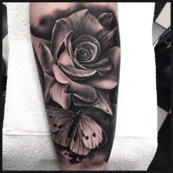 Stunning Black Ink Realistic Rose & Butterfly Tattoo On Outer Forearm By Pete the Thief