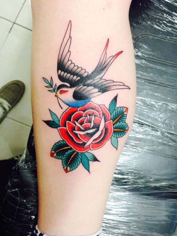 Traditional Rose And Swallow With Olive Branch Tattoo On Forearm