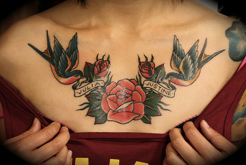 Wonderful Red Roses & Swallow Tattoo On Girl’s Chest