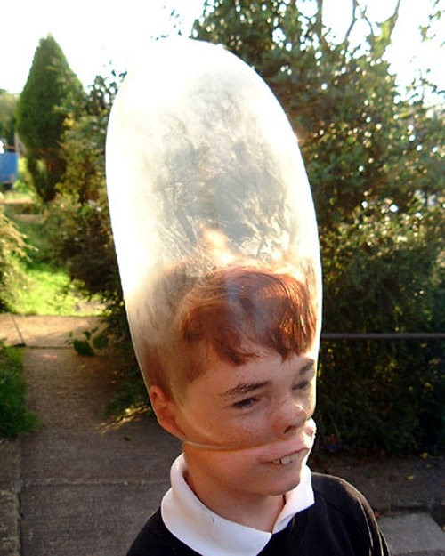 bonehead kid with balloon over head funny picture