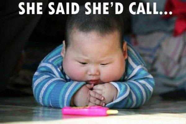 funny kid waiting for call on phone
