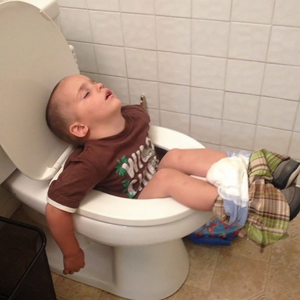 kid sleeping on toilet funny picture