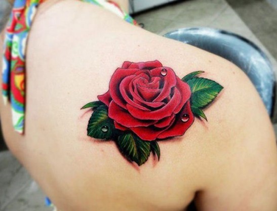 3D Realistic Red Rose With Green LeavesTattoo On Girl Right Back Shoulder