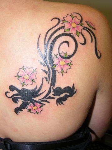 Amazing Pink Flowers & Tribal Black Dragon Tattoo On Girl Back Shoulder