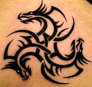 Black 3 face tribal dragon tattoo on body
