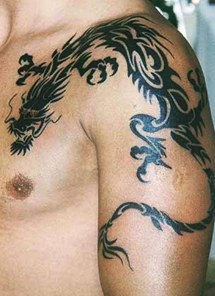 Tribal Dragon Tattoos Arm.
