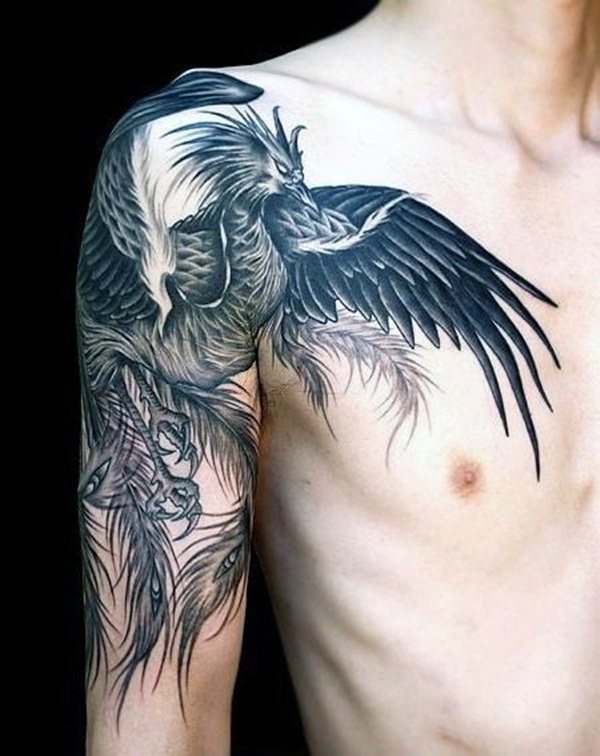 Black Ink flying phoenix tattoo on men’s shoulder and arm