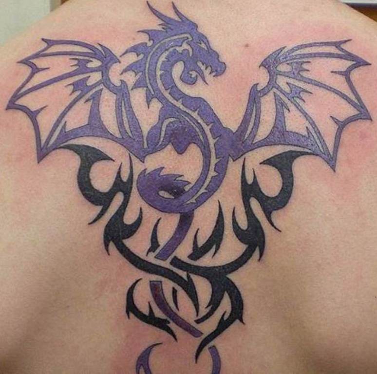 Black Japanese tribal dragon tattoo on back