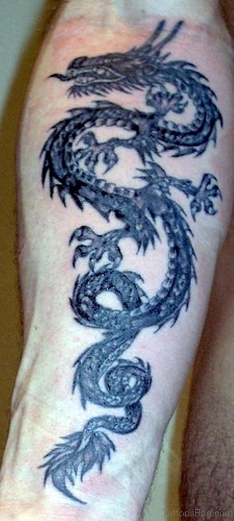 Black Spiral Dragon tattoo on full inner forearm