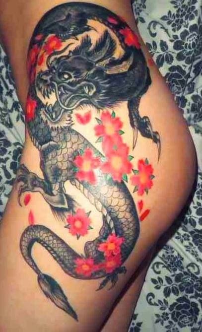 Black and ref dragon flower tattoo on left body for women