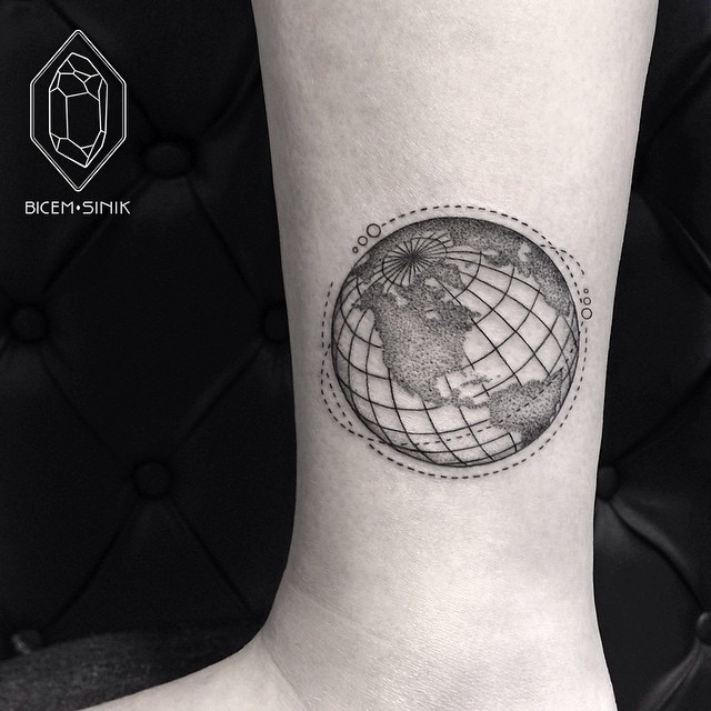 Black and white shaded earth tattoo with grid on left lower leg by Bicem Sinik