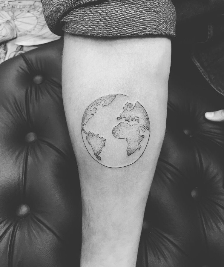 Black simple shaded globe earth tattoo on inner hand
