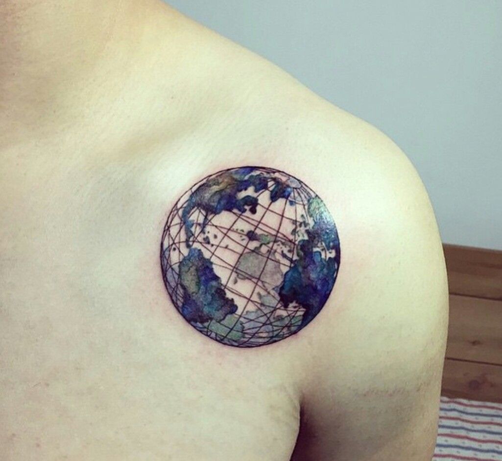 Blue 3d earth Globe tattoo on left upper shoulder