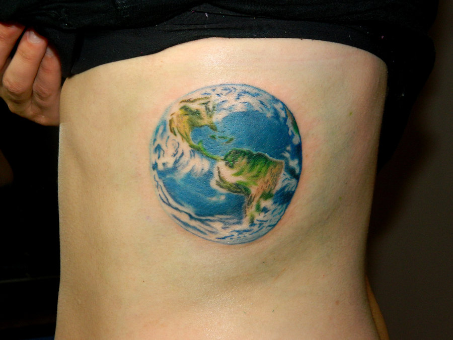 Blue and green globe earth tattoo on body