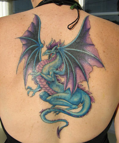 Blue and purple dragon tattoo on girl back