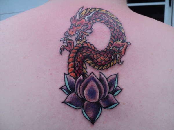 Colorful Dragon With Purple Lotus Tattoo On Upper Back