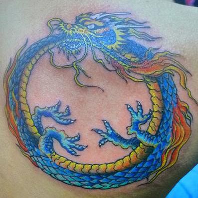 Colorful Serpent dragon in circle tattoo