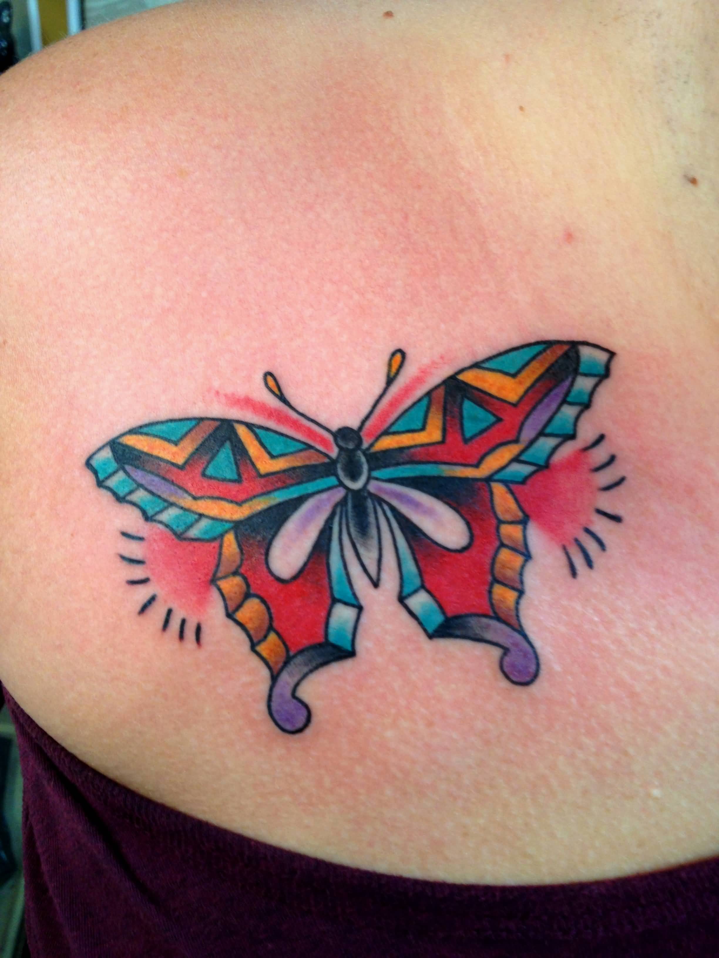 Colorful Traditional Butterfly Tattoo on Women left back shoulder