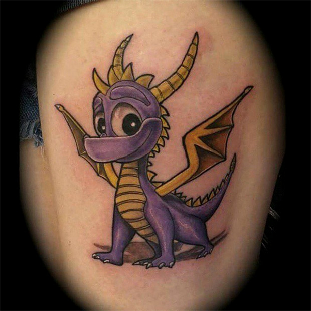 Colorful cute baby dragon tattoo