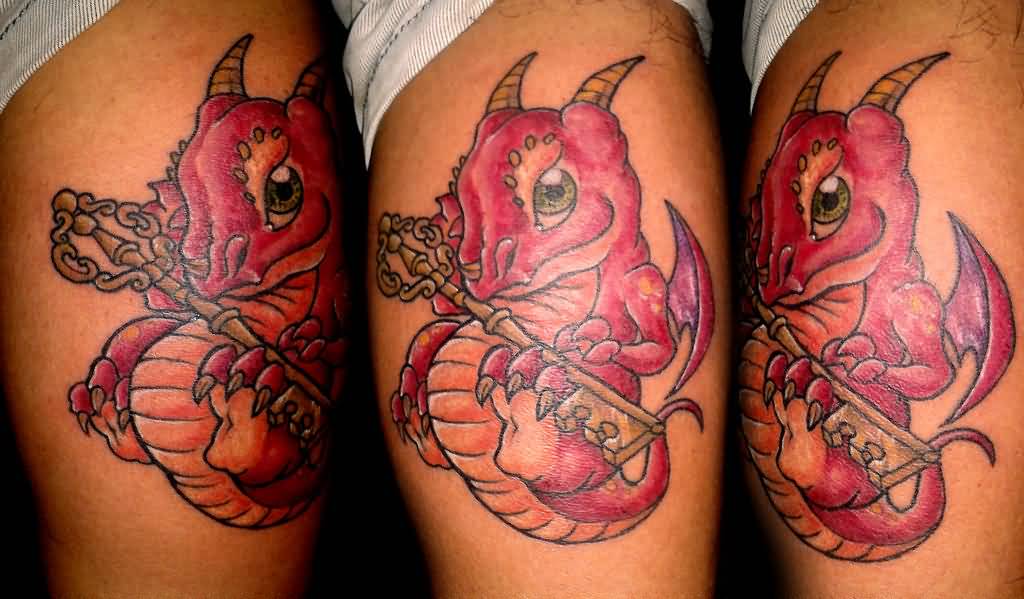 Colored baby dragon tattoo with key on arm for women