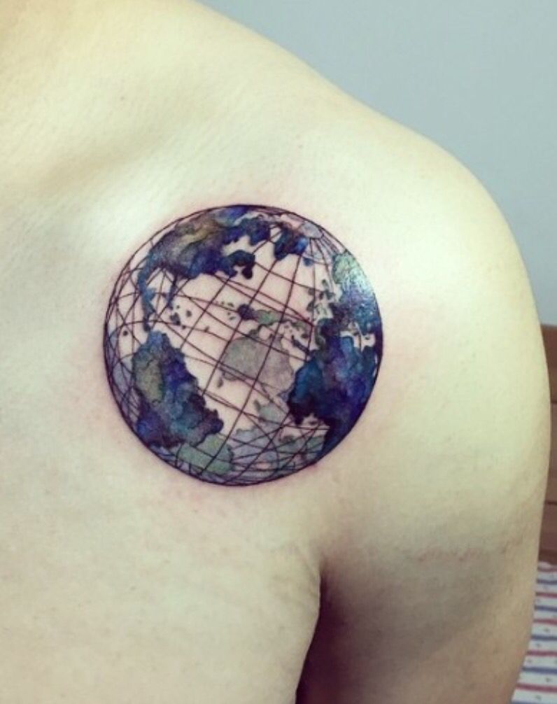 Colored globe earth tattoo with grid on front left upper body