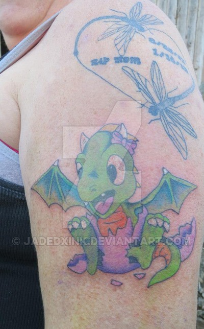 Colorful baby dragon tattoo on left upper arm jadedxink