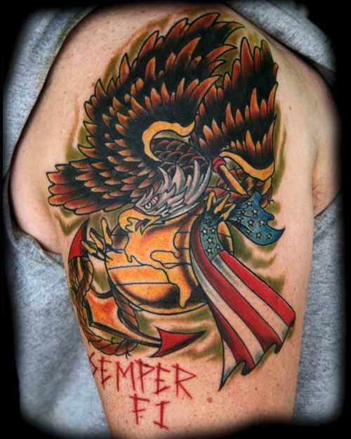 Colorful globe, eagle and anchor tattoo on upper arm