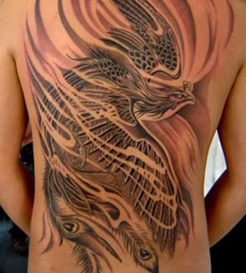 Full back grey ink phoenix on flames tattoo for women
