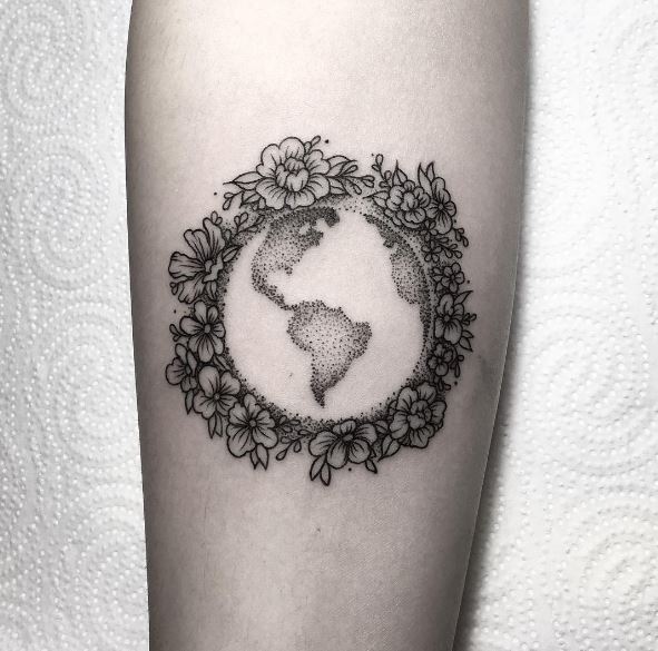 Grey Ink Feminine Earth Decorated With Flowers Tattoo On Forearm