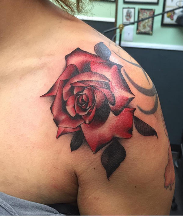 Lovely red rose tattoo design on Woman’s shoulder
