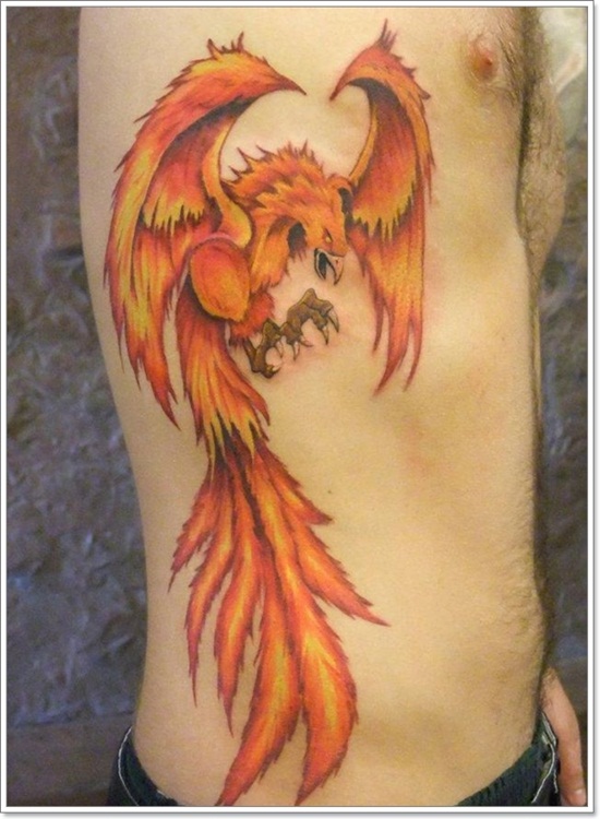 Orange flying phoenix tattoo on male side ribcage