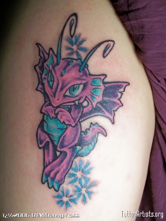 Purple and blue baby dragon tattoo on arm