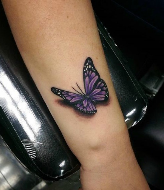 Purple 3D butterfly tattoo on lower upper arm