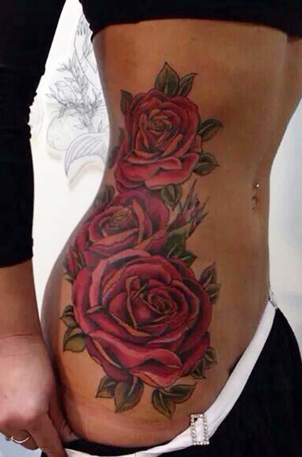 Red Roses Tattoo On Thigh
