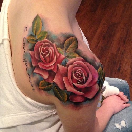 Red roses women shoulder tattoo with gray blue background and the words of love