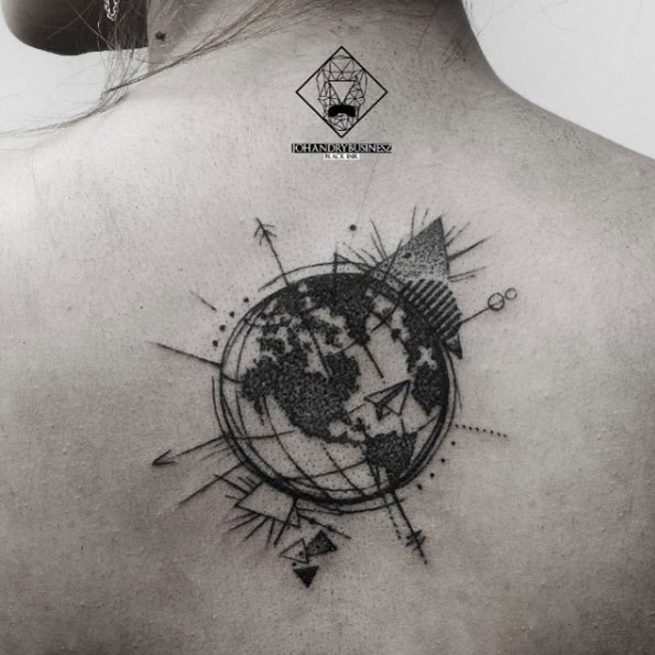 Sketched globe tattoo on middle upper shoulder