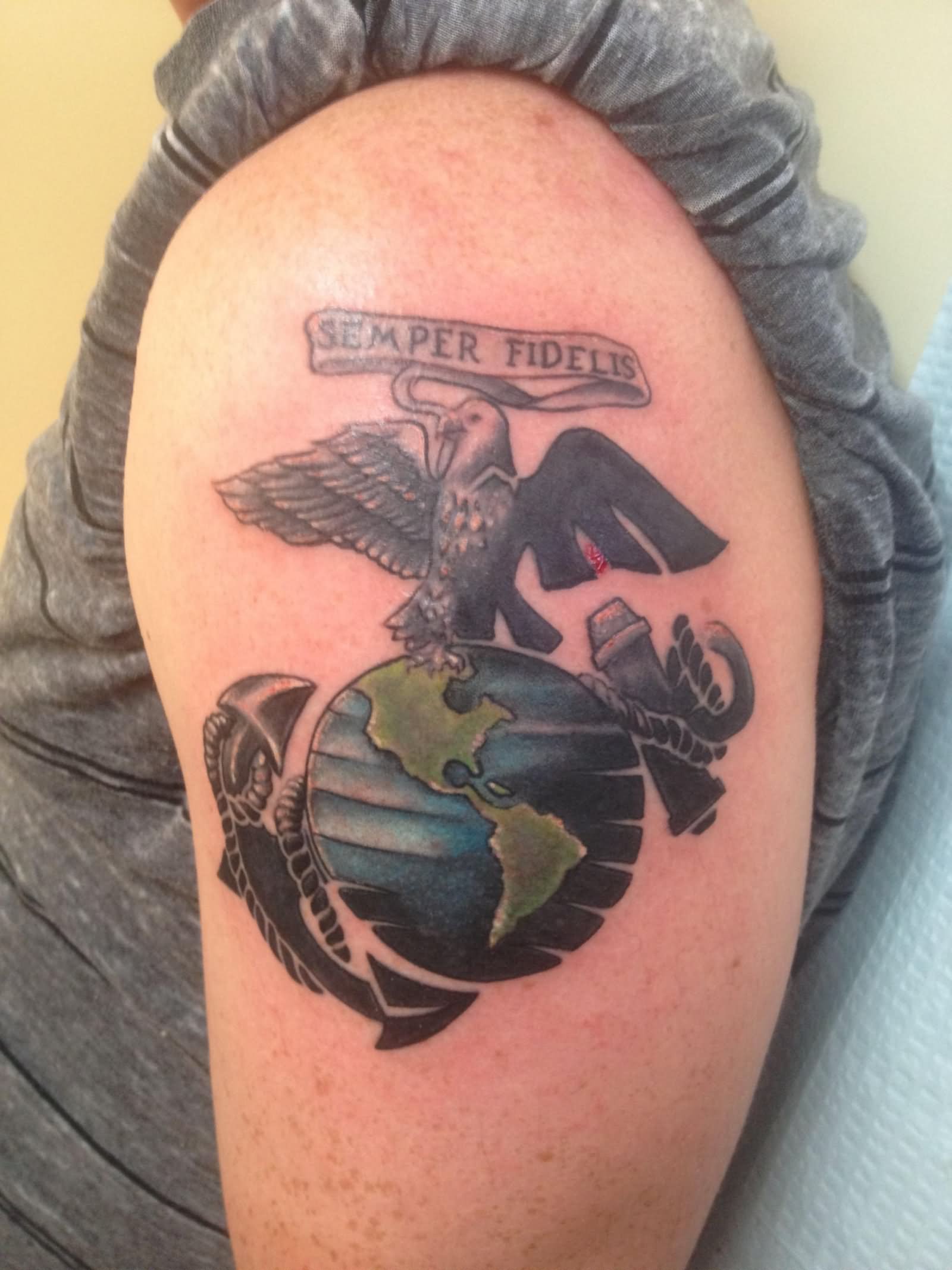 Traditional, mixed new era Eagle, Globe and Anchor tattoo by Kylee McCoy, owner of Oregon Heart Tattoo