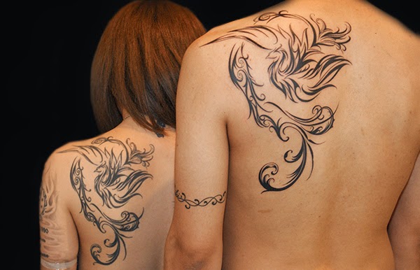Tribal Phoenix Tattoo On Girl Back Shoulder